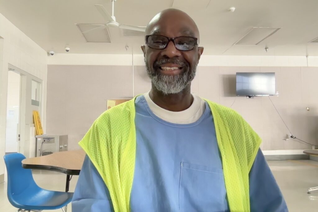 Frank Washington smiles after a meeting with The Innocence Center's lawyers